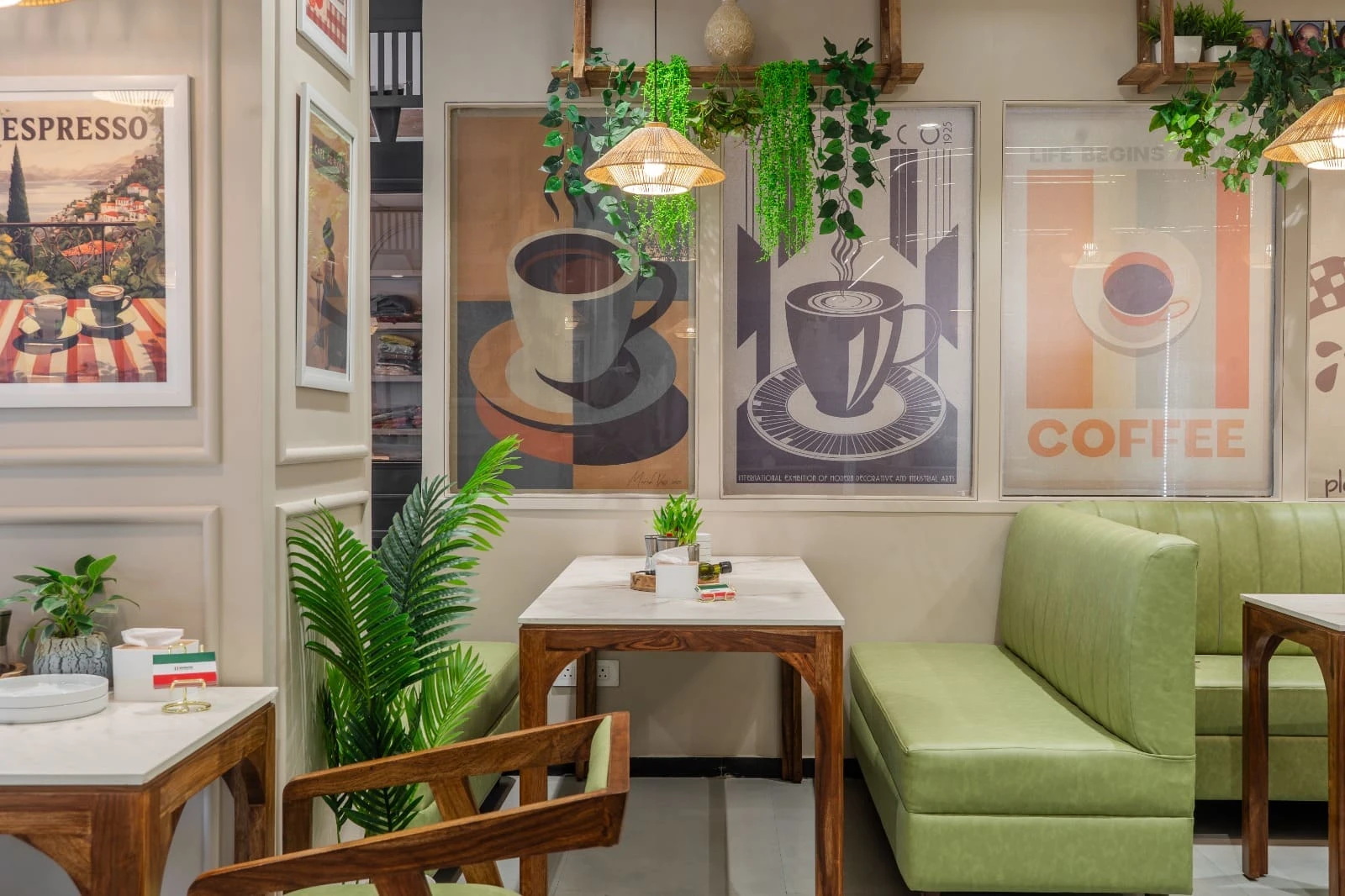 Green booth seating and coffee artwork at Brunatos